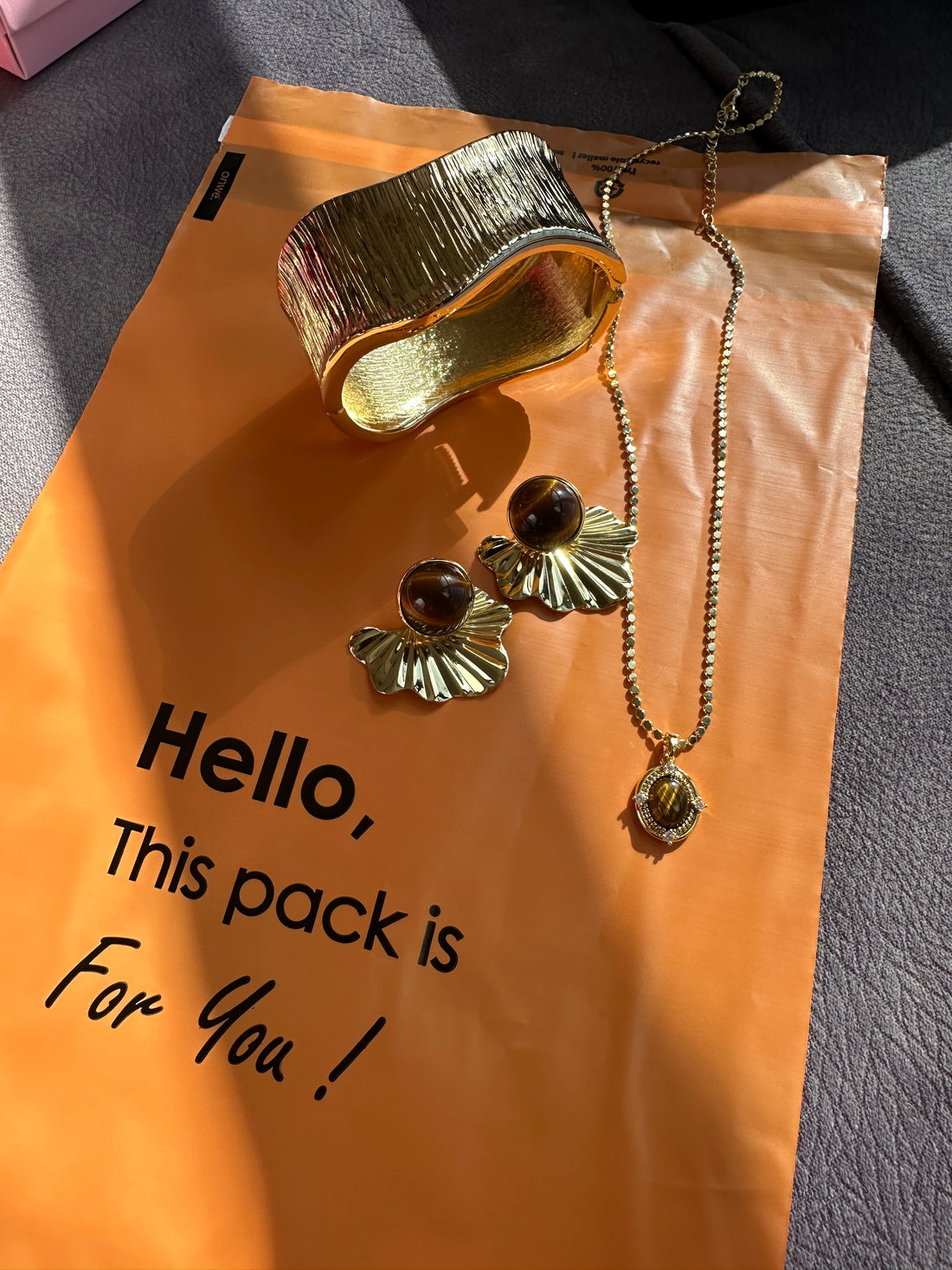 Çelik kahverengi kolye